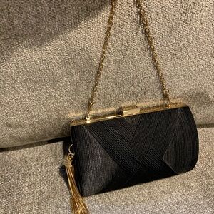 Stylish Black and Gold Clutch Bag